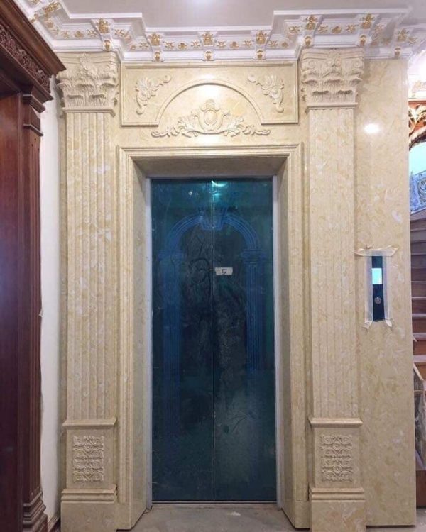 Đá marble vàng ốp thang máy